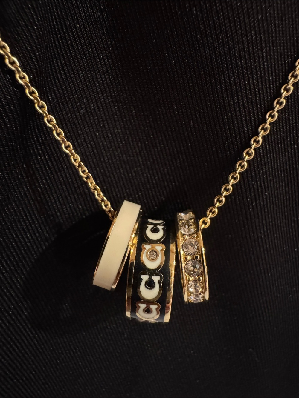 NWOT - Coach Gold-Tone Multi-Ring Pendant Necklace with Black Accents